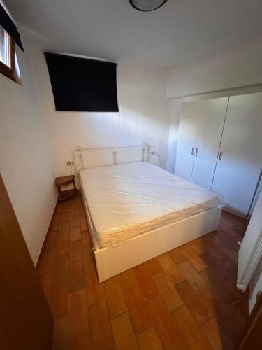 Ένα ή περισσότερα κρεβάτια σε δωμάτιο στο Torbole Lake View Retreat