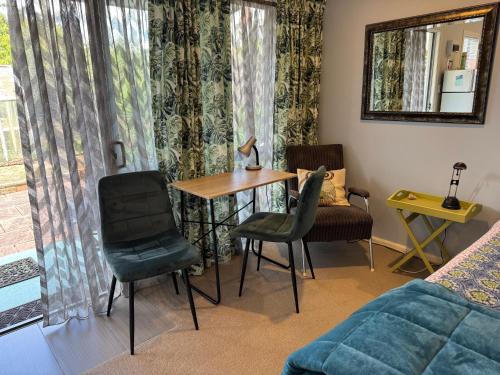 Posezení v ubytování Cosy Caversham Retreat