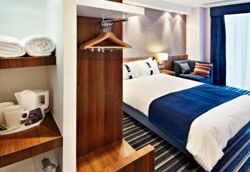 Postel nebo postele na pokoji v ubytování Holiday Inn Express Madrid Leganes by IHG