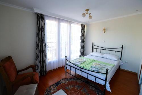 Postel nebo postele na pokoji v ubytování LINIKANI