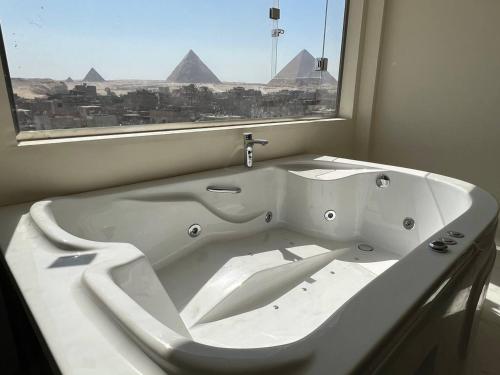 Fotografie z fotogalerie ubytování Pyramids hotel Merak v destinaci Banī Ghālib