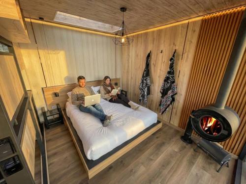 En eller flere senge i et værelse på Tiny house, comfort and peace facing Chimborazo