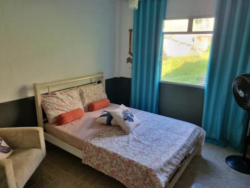 Postel nebo postele na pokoji v ubytování Espaço Verde Hospedagem