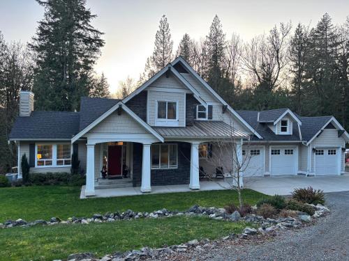 a house with a gambrel at Sumas Mountain basement suite in Abbotsford