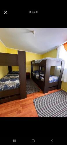 Кровать или кровати в номере Hospedaje Mary