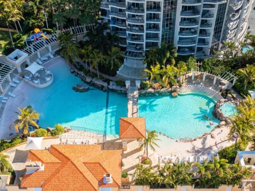 an aerial view of a pool at a resort at Towers of Chevron - Private Apartments - Hosted by Coastal Letting Co. in Gold Coast