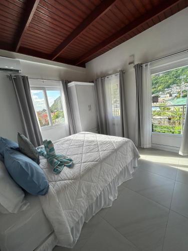 Кровать или кровати в номере Agape Suites-Room 5-2nd Floor