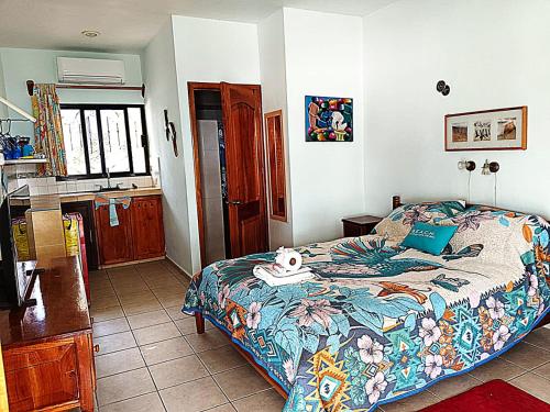 Ένα ή περισσότερα κρεβάτια σε δωμάτιο στο Celeste Vida