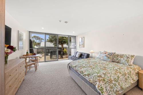 En eller flere senge i et værelse på Bay View Motel - Deluxe