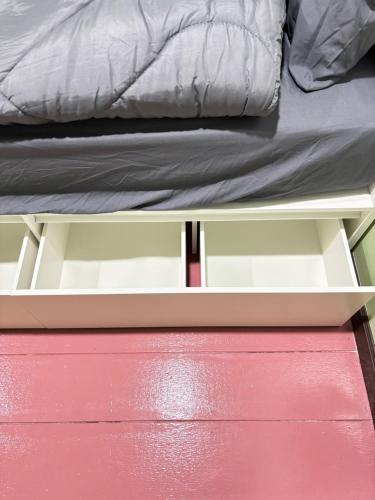 En eller flere senge i et værelse på Milo House