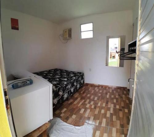 Postel nebo postele na pokoji v ubytování Suites e Quartos Atalaia Salinas PA