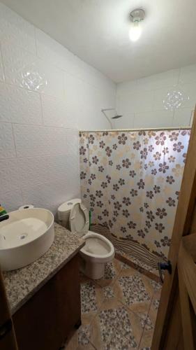 a bathroom with a sink and a toilet at Casa Rancho El Capulín en Grutas de Tolantongo