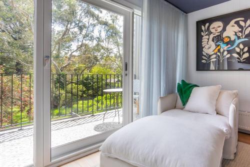 En eller flere senge i et værelse på Beachcomber Shoreham