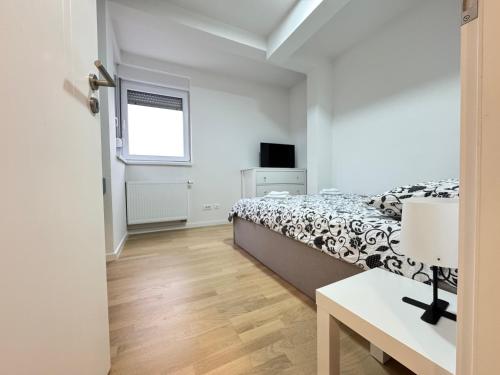 Телевизор и/или развлекательный центр в A&A Sarajevo