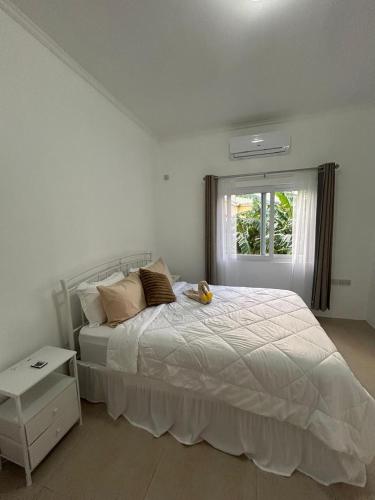 Postel nebo postele na pokoji v ubytování Agape Suites-Room 3- 1st Floor