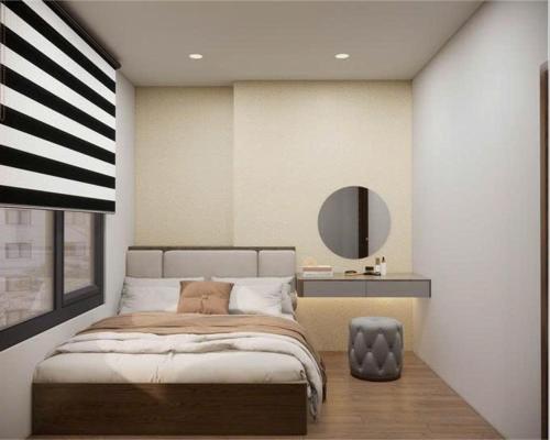 Asahi Luxstay - Benhill Apartment Binh Duong في Thuan An: غرفة نوم بها سرير كبير ومرآة