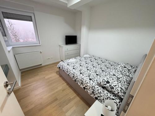 Кровать или кровати в номере A&A Sarajevo