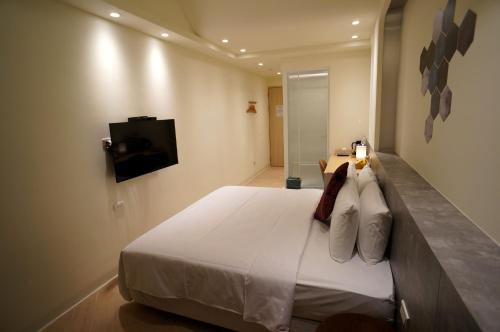 Μια τηλεόραση ή/και κέντρο ψυχαγωγίας στο 向陽海 Sun&Sea INN