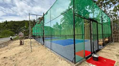Facilități de tenis și/sau squash la sau în apropiere de Inbox Siargao Resort