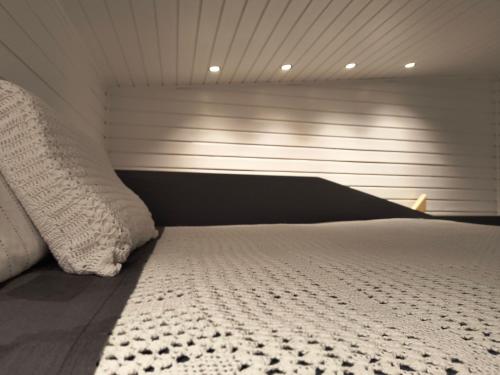 Postel nebo postele na pokoji v ubytování Refugio Maẅen