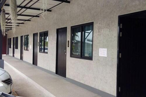 a row of doors on the side of a building at The Loft @Chiangrai in Ban Du