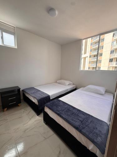 Postel nebo postele na pokoji v ubytování Apartamento Bella vista