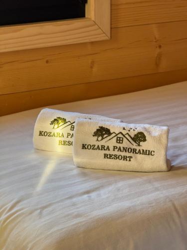 un asciugamano seduto sopra un letto di Kozara Panoramic Resort a Bosanska Gradiška