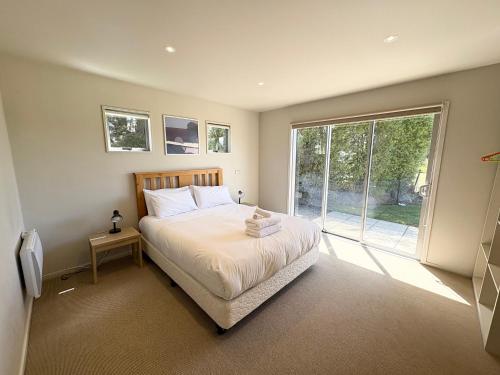 Postel nebo postele na pokoji v ubytování The Barn