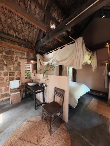 Postel nebo postele na pokoji v ubytování Tre Yoga Retreat