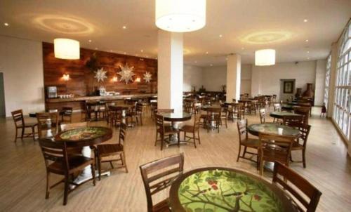 En restaurant eller et andet spisested på Beira Rio Palace Hotel