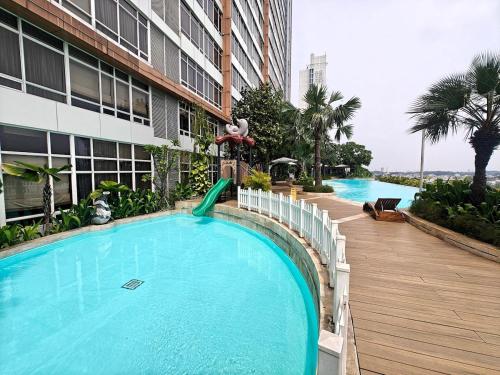 Φωτογραφία από το άλμπουμ του Stylish 3BR Skandinavia Tangcity Apt Max 12 Guests σε Karawaci