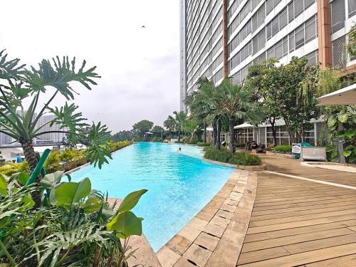 Φωτογραφία από το άλμπουμ του Stylish 3BR Skandinavia Tangcity Apt Max 12 Guests σε Karawaci