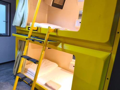 Palanda nebo palandy na pokoji v ubytování Hotel Shin-Imamiya