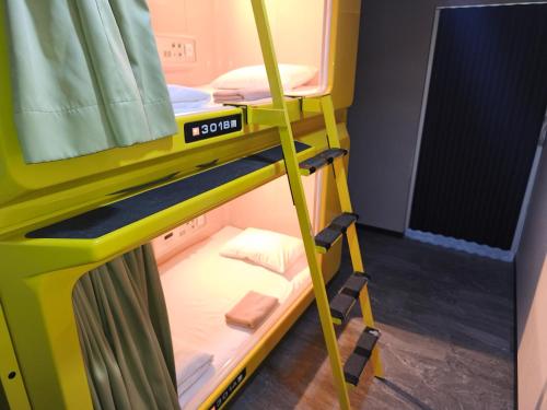 Postel nebo postele na pokoji v ubytování Hotel Shin-Imamiya