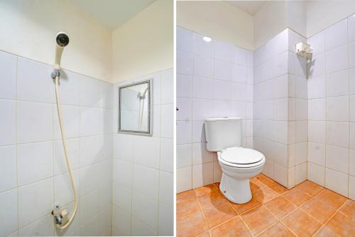 Koupelna v ubytování OYO 95064 Gunung Putri Skyland