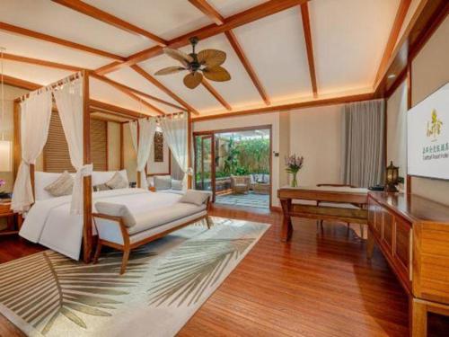 En eller flere senge i et værelse på Dongguan Castfast Hotel