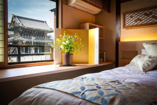 Un pat sau paturi într-o cameră la Ohanabo