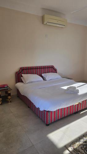 Postel nebo postele na pokoji v ubytování Sunset view hill jabal shams