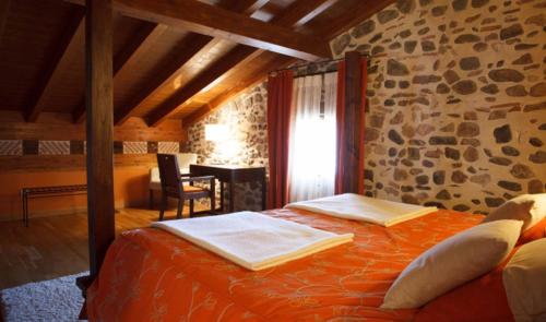 Posteľ alebo postele v izbe v ubytovaní Hostal Casa Masip