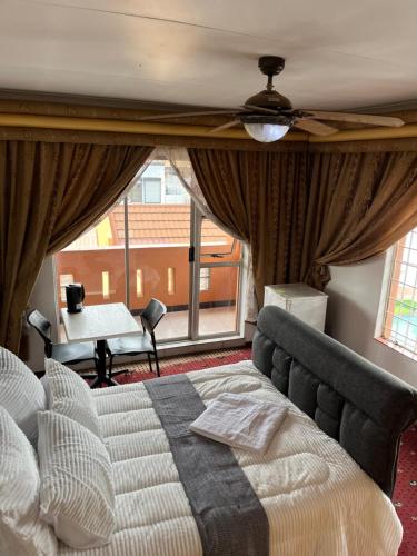 Et opholdsområde på Lenisia Corporate Guest House