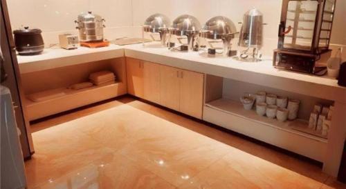 Fotografie z fotogalerie ubytování City Comfort Inn Zhuhai Jinwan Hangkong Xincheng v destinaci Baigaonongchang