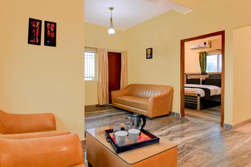 Χώρος καθιστικού στο Super Hotel O Birsa Athletics Stadium Formerly De Anmol Suites