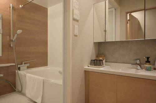 Phòng tắm tại Gouhou Garden Hotel Asakusa