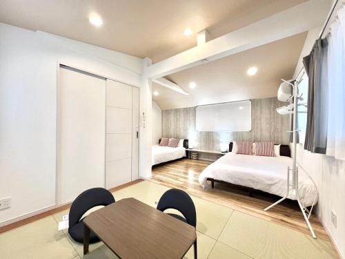 Кровать или кровати в номере Ichigayayanagichō 牛込柳町一户建-SJ0186