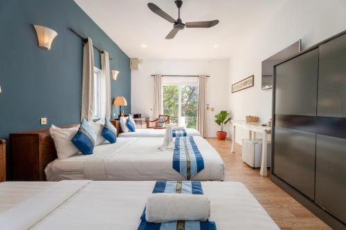 Postel nebo postele na pokoji v ubytování Samaya Boutique & Cuisine