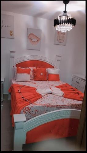 En eller flere senge i et værelse på Sunshine paradise