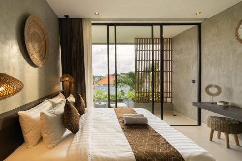 Postel nebo postele na pokoji v ubytování Kayat Villa