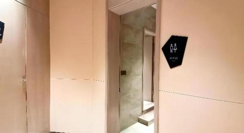 Un baño de Echarm Hotel Wuhan Gaotie Jianshe 2nd Road Metro Exit