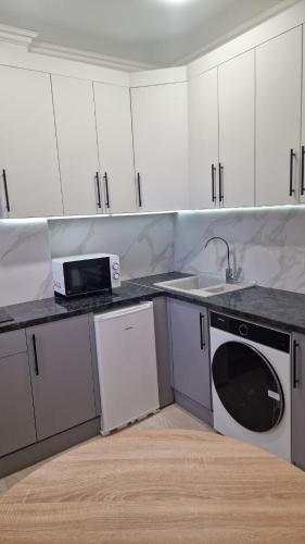 Кухня або міні-кухня у Centrala