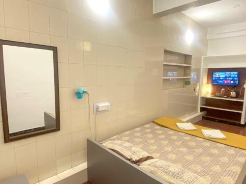 Postel nebo postele na pokoji v ubytování La Ruelle Guest House